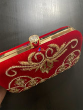 Hand embroidery clutches