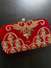 Hand embroidery clutches